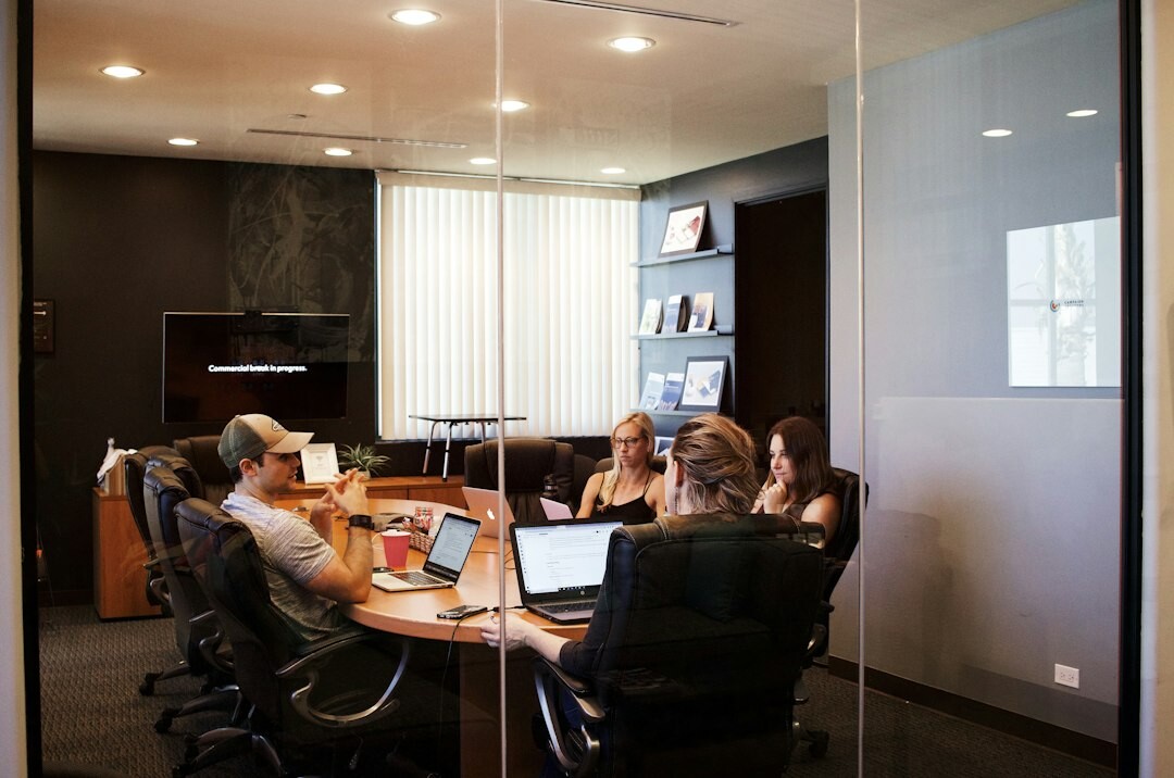 corporate team discussing code
