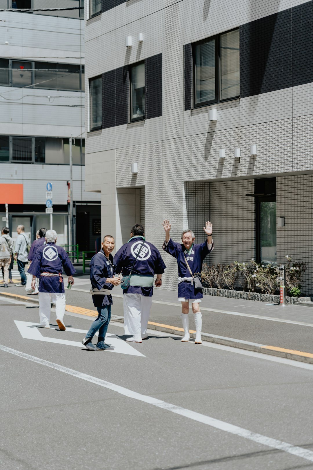 Japanese business team celebrating a successful project launch